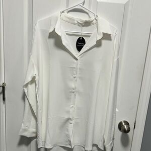 NWT Women’s soft button down shirt size L.
